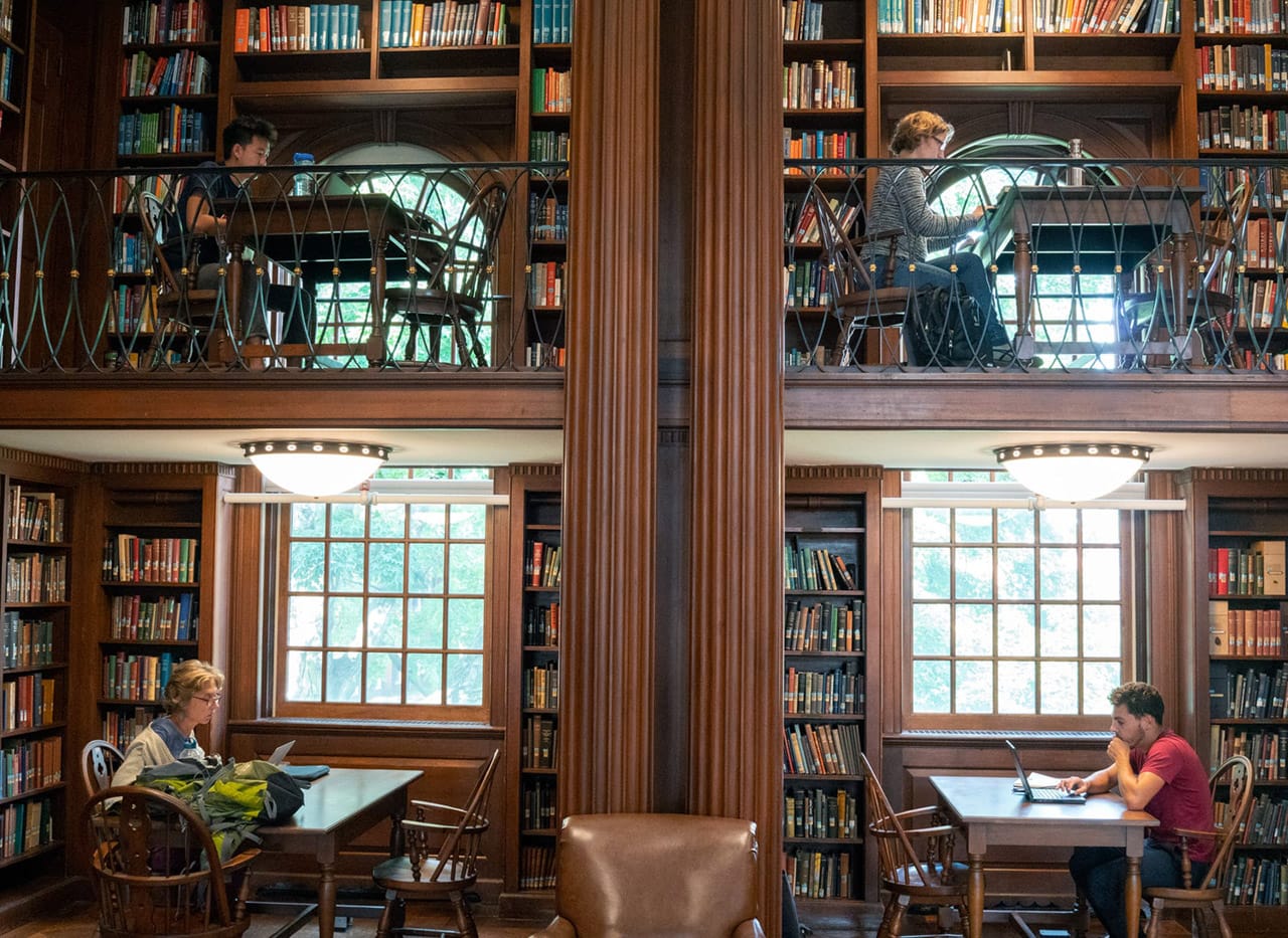 Students studying in the Day Missions Room of the Divinity School library